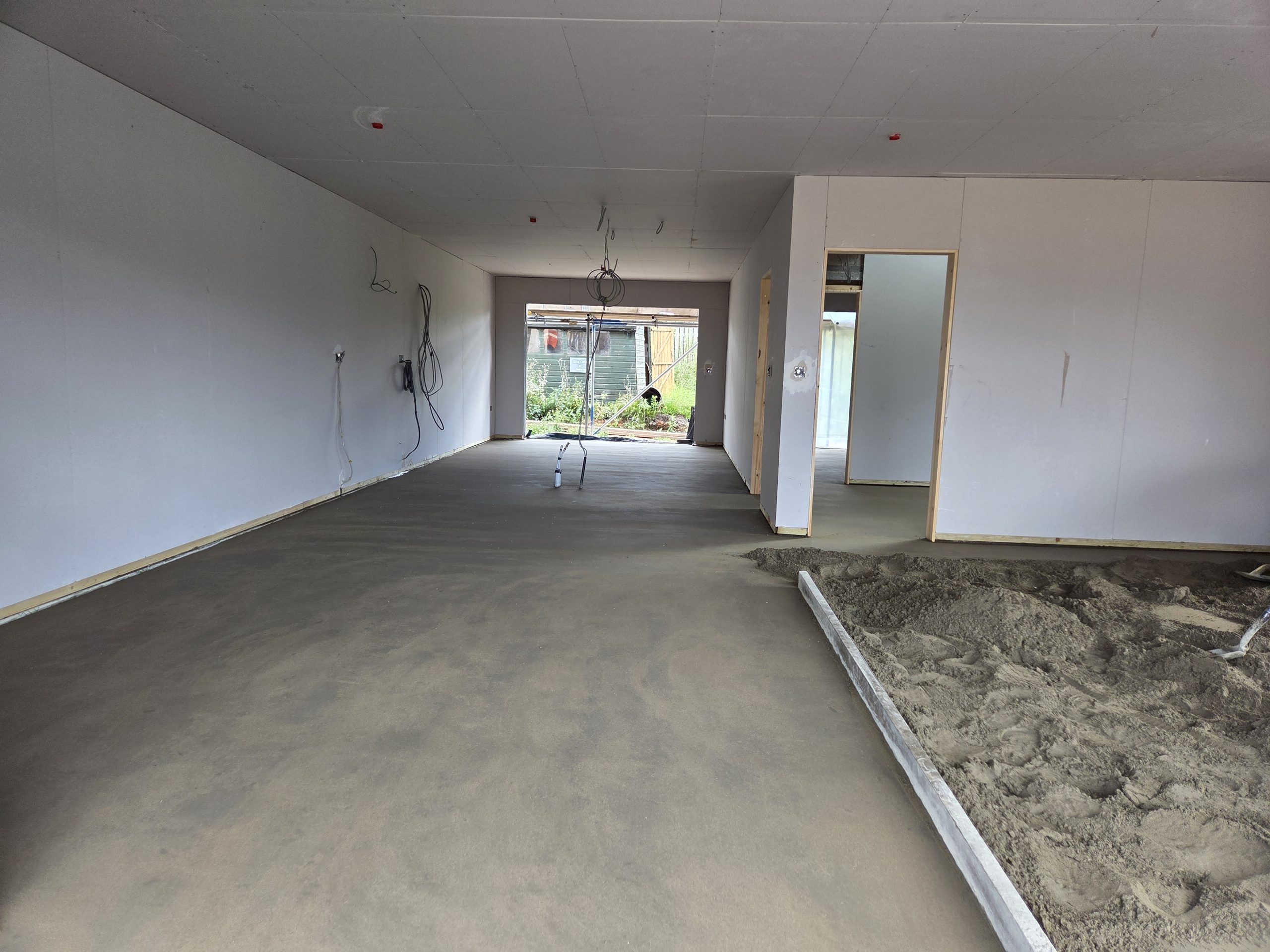 Stanley House underfloor heating and screed are installed